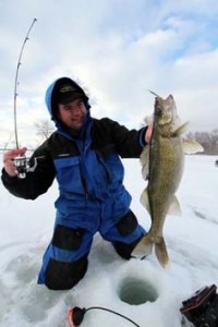 Guy with jig pole and walleye