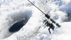 ice fishing hole with fishing pole